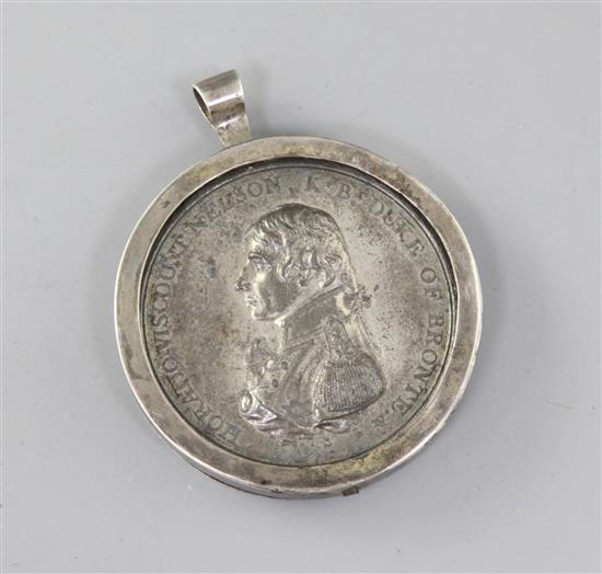 An early 19th century white metal Trafalgar medal by Matthew Boulton, width 2in.